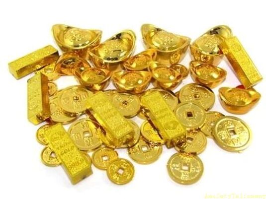 lingotti e monete d'oro come amuleti della fortuna